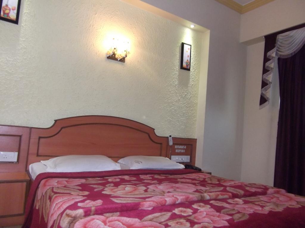 Hotel Ravikant Pune Rum bild